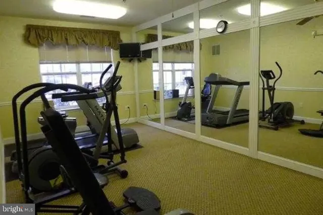 a view of a room with gym equipment