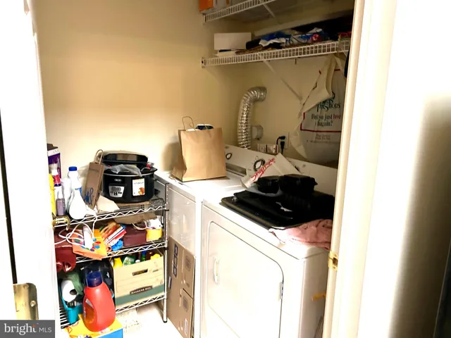 a kitchen with a stove and cabinets