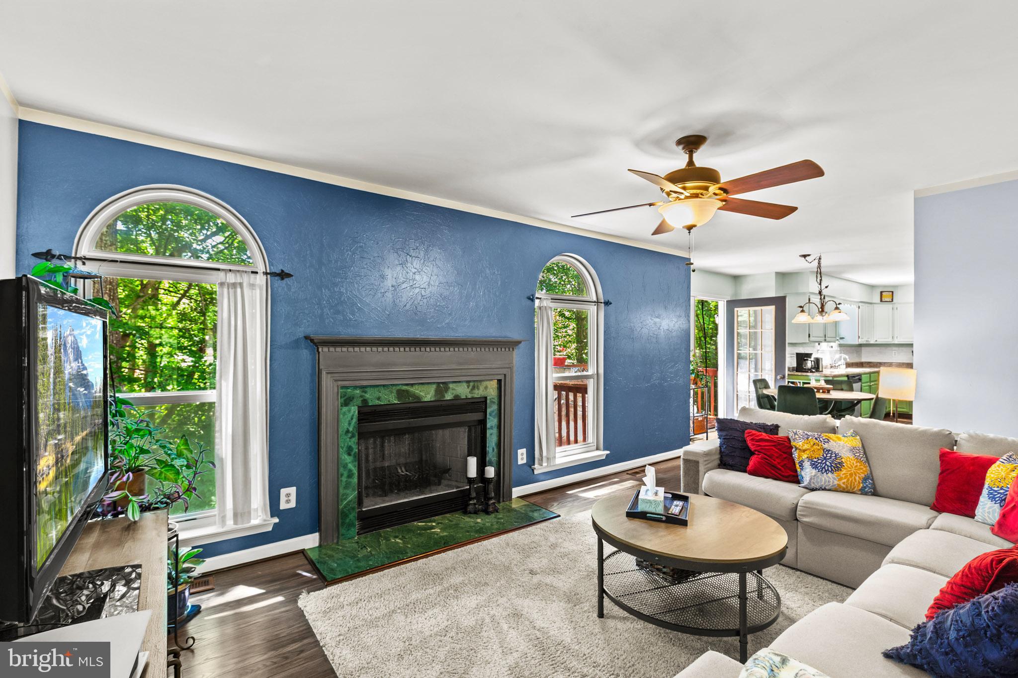 667 San Gabriel Road Lusby, MD 20657 - Photo 10 of 30 Family Room with Cozy Wood burning fireplace.