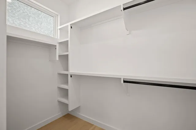 a view of an empty walk in closet