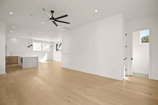 a view of a kitchen with a dishwasher and a refrigerator