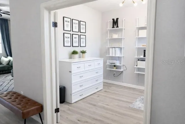 a workspace with a bookshelf