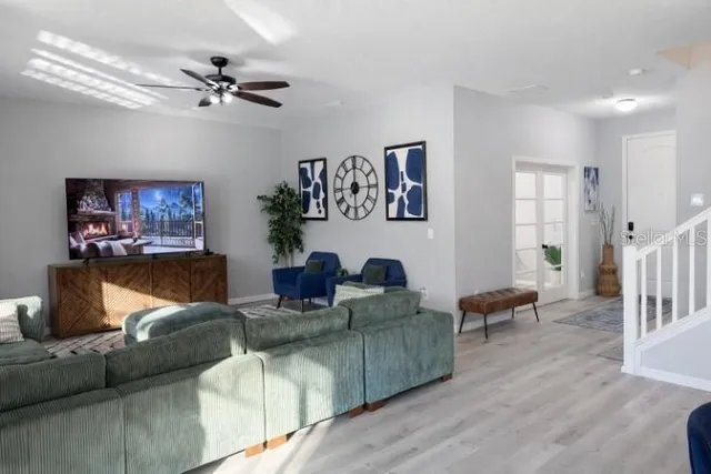 a kitchen with a granite countertop sink a counter top space and cabinets