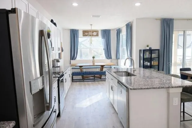 a bathroom with a sink and mirror