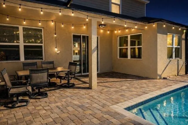 a view of a lobby with furniture and floor to ceiling window