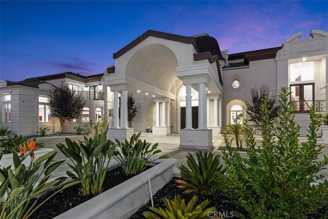 a bathroom with a sink vanity granite tub and shower
