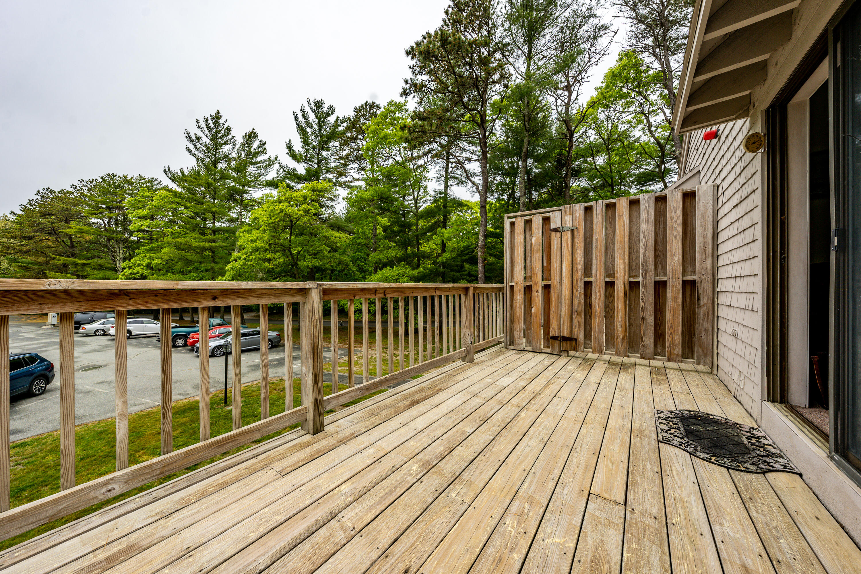 70 Cape Drive, Unit 12D Mashpee, MA 02649 - Photo 2 of 13 a view of wooden deck