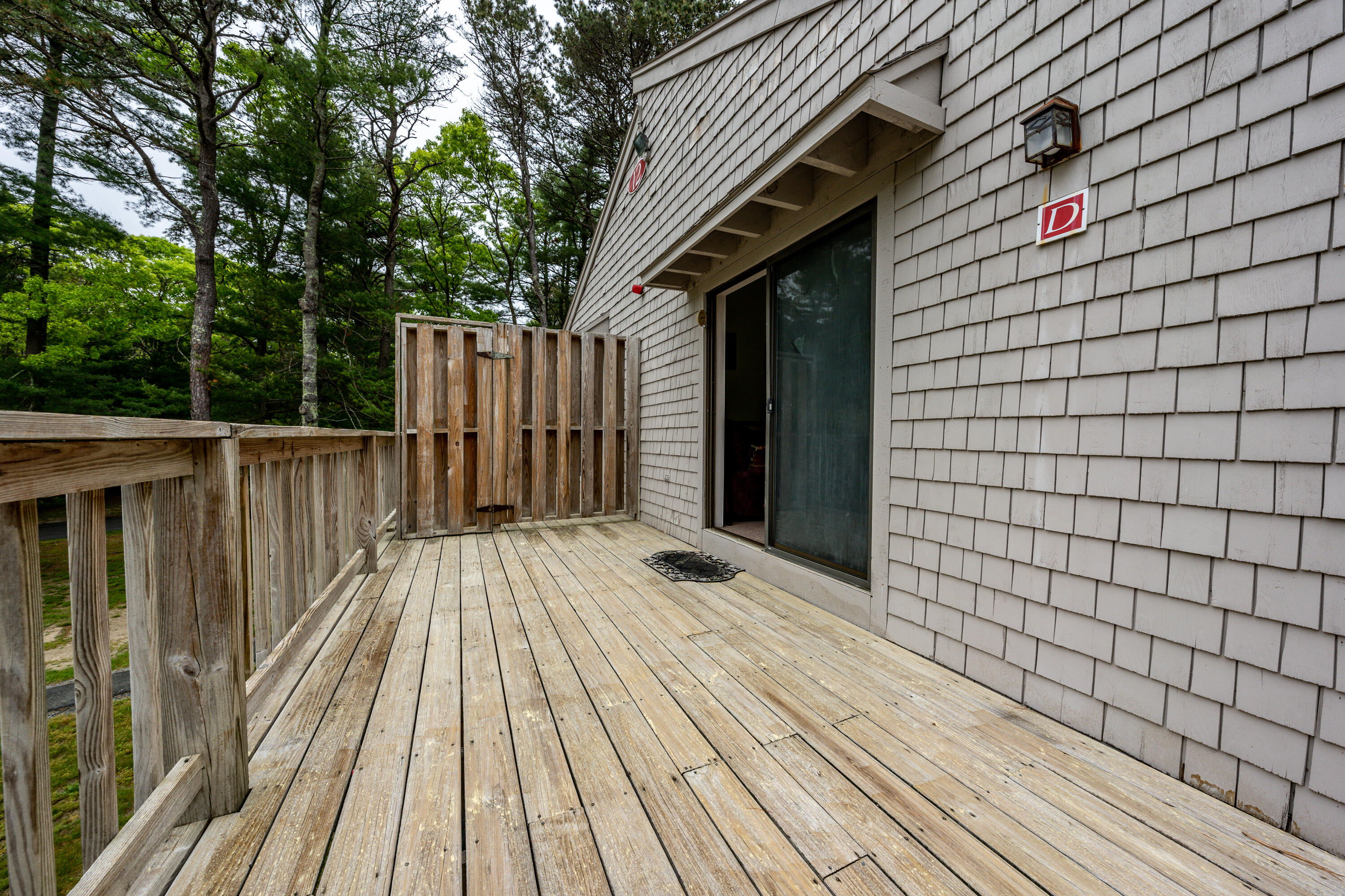70 Cape Drive, Unit 12D Mashpee, MA 02649 - Photo 3 of 13 a view of wooden deck