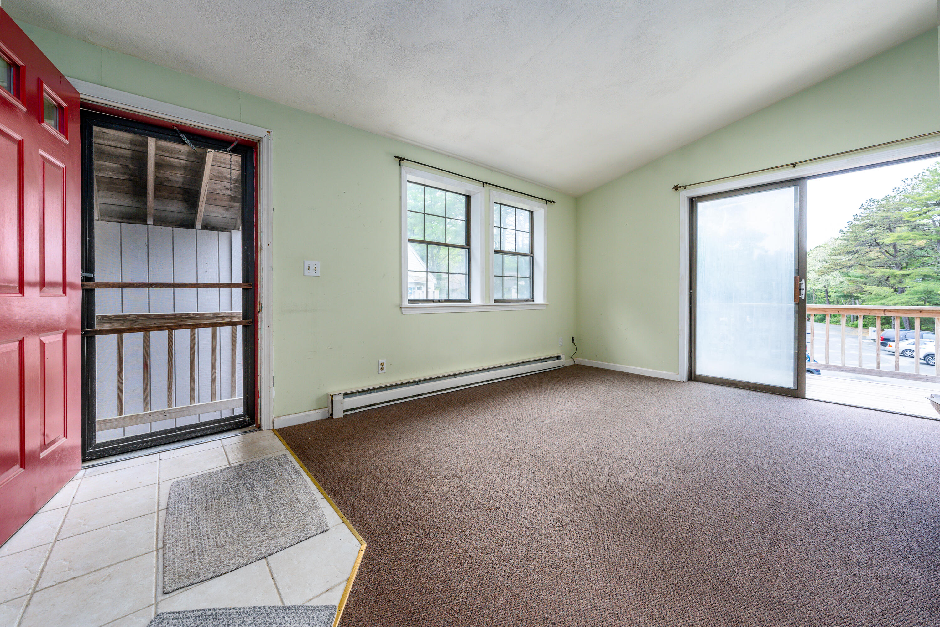 70 Cape Drive, Unit 12D Mashpee, MA 02649 - Photo 4 of 13 an empty room with windows