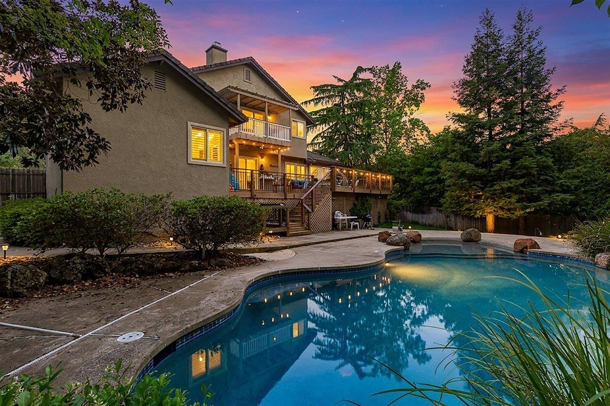 2565 Bertella Road Cameron Park, CA 95682 - Photo 2 of 31 a view of a house with swimming pool and sitting area
