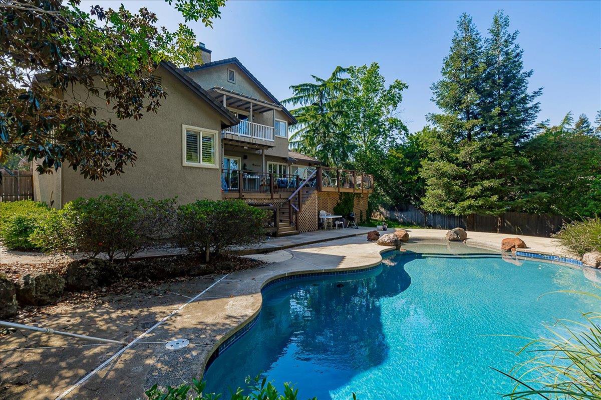 2565 Bertella Road Cameron Park, CA 95682 - Photo 30 of 31 a view of a house with swimming pool and sitting area