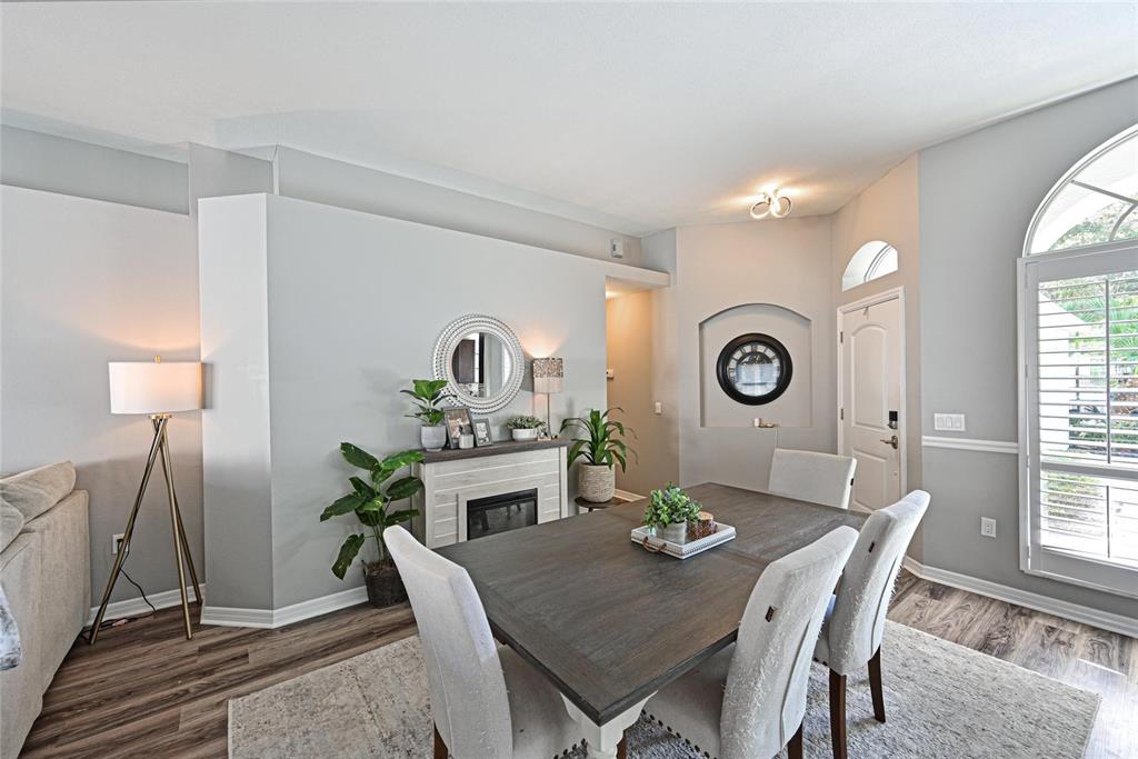 12709 Nightshade Place Lakewood Ranch, FL 34202 - Photo 13 of 53 a living room with furniture and window