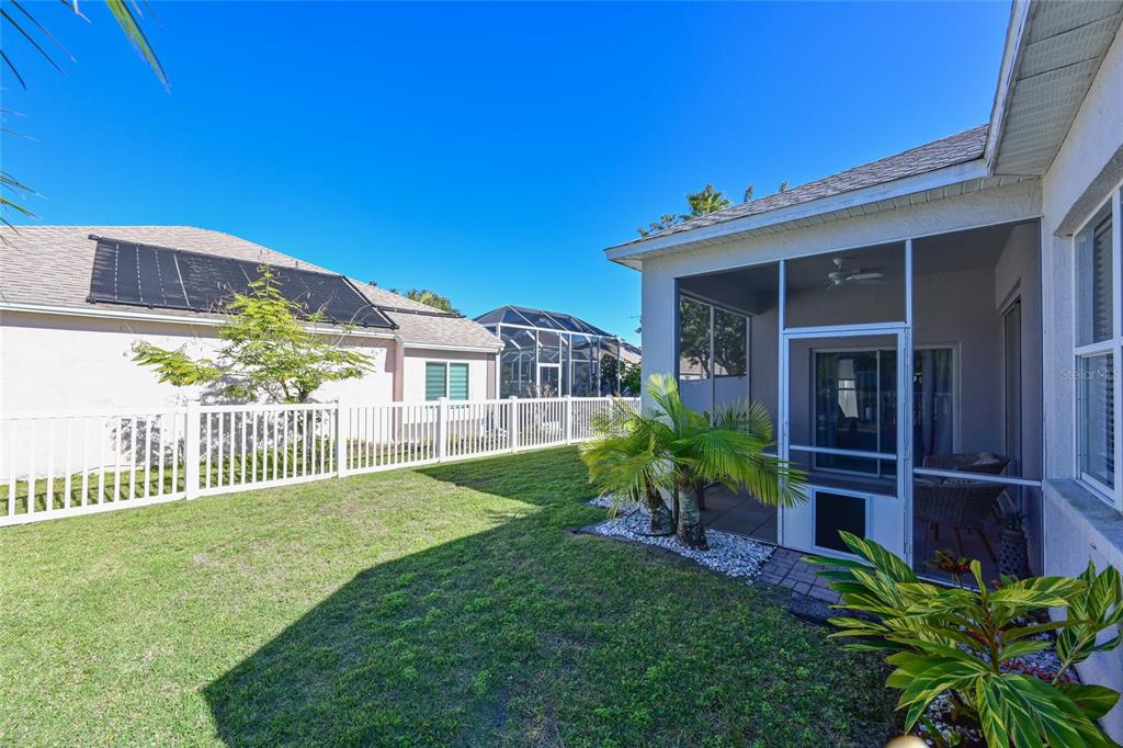12709 Nightshade Place Lakewood Ranch, FL 34202 - Photo 22 of 53 a front view of a house with a yard