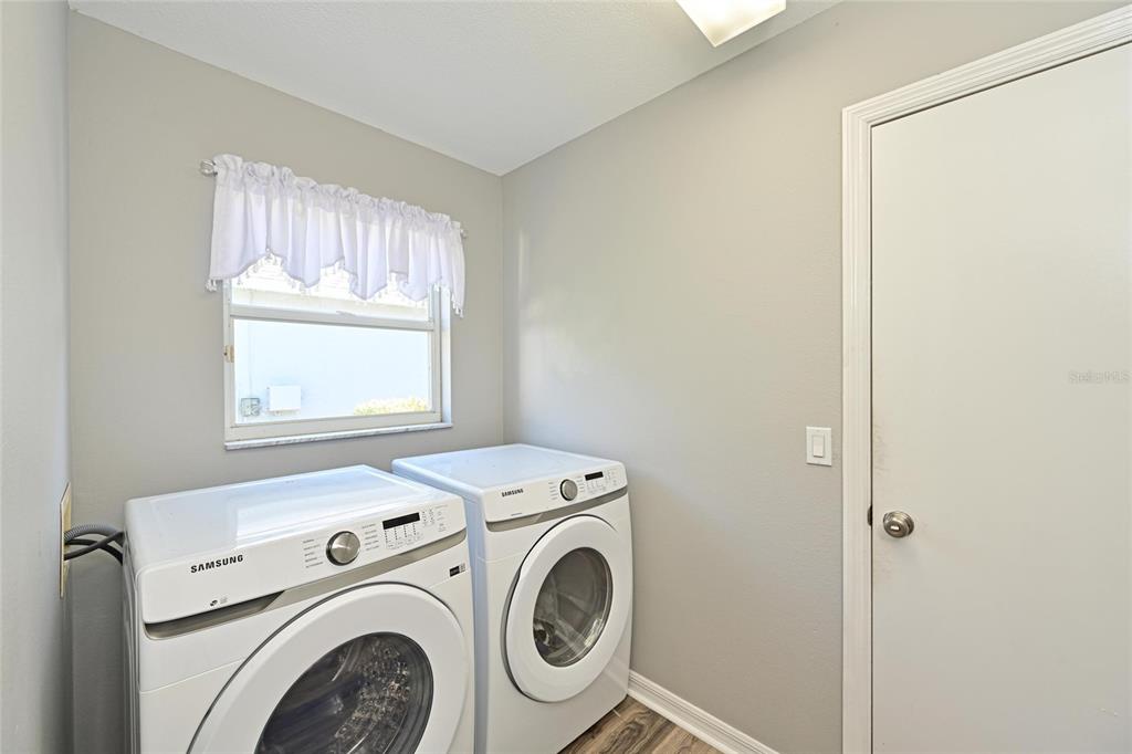 12709 Nightshade Place Lakewood Ranch, FL 34202 - Photo 25 of 53 a utility room with dryer and washer