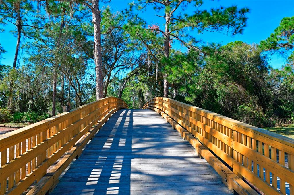 12709 Nightshade Place Lakewood Ranch, FL 34202 - Photo 37 of 53 a view of deck with wooden floor and fence