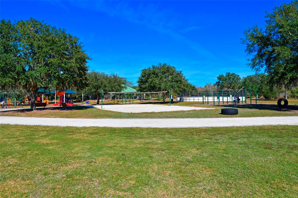 12709 Nightshade Place Lakewood Ranch, FL 34202 - Photo 43 of 53 a view of street with houses and trees