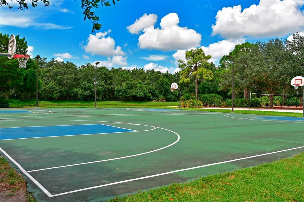12709 Nightshade Place Lakewood Ranch, FL 34202 - Photo 45 of 53 a view of a tennis court