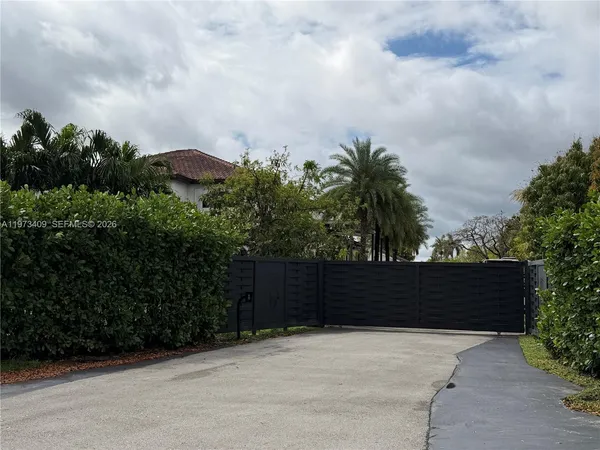 a view of terrace with wooden fence