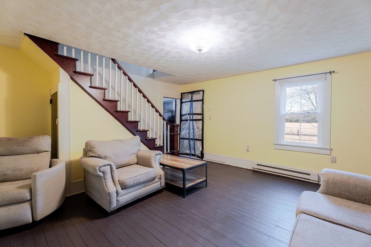 723 Sedwick Road Luray, VA 22835 - Photo 15 of 51 a living room with furniture and a wooden floor