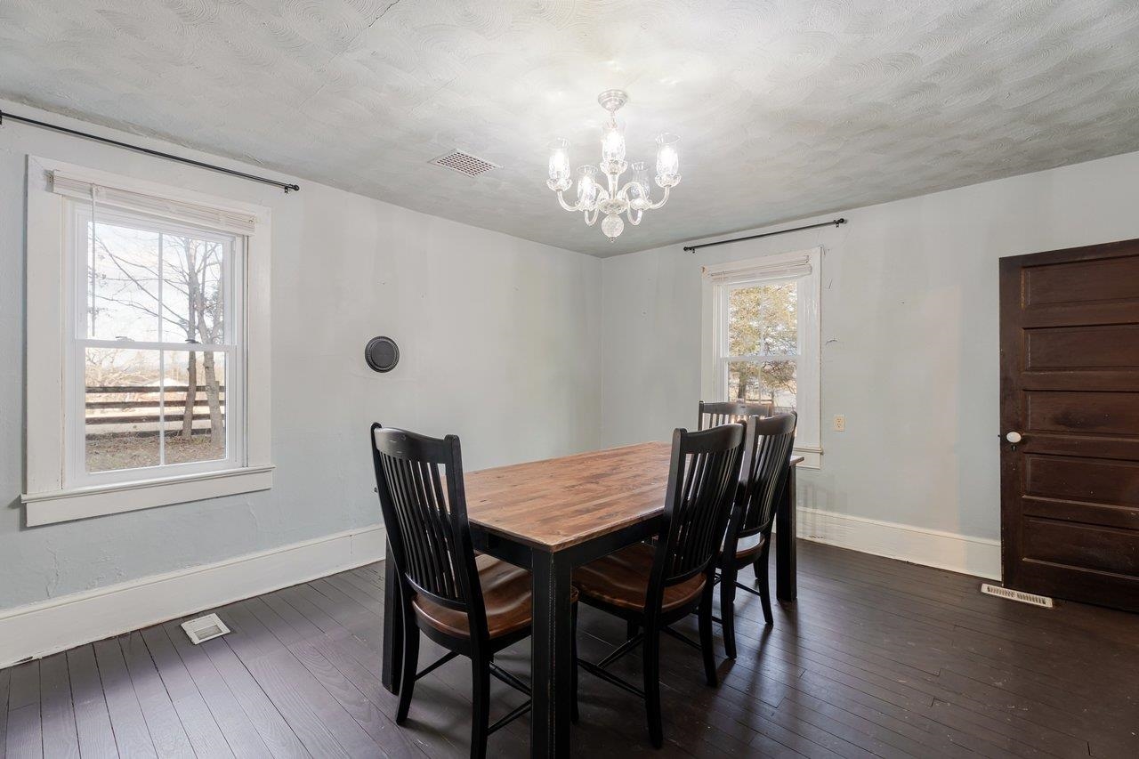 723 Sedwick Road Luray, VA 22835 - Photo 16 of 51 a view of a dining room with furniture window and wooden floor