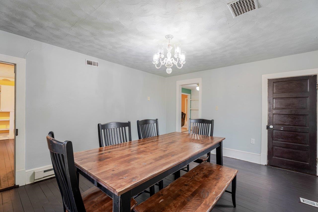 723 Sedwick Road Luray, VA 22835 - Photo 18 of 51 a view of a dining room with furniture and wooden floor