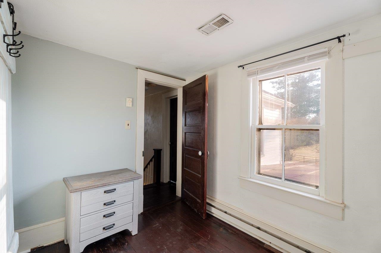 723 Sedwick Road Luray, VA 22835 - Photo 22 of 51 a view of room with window and wooden floor