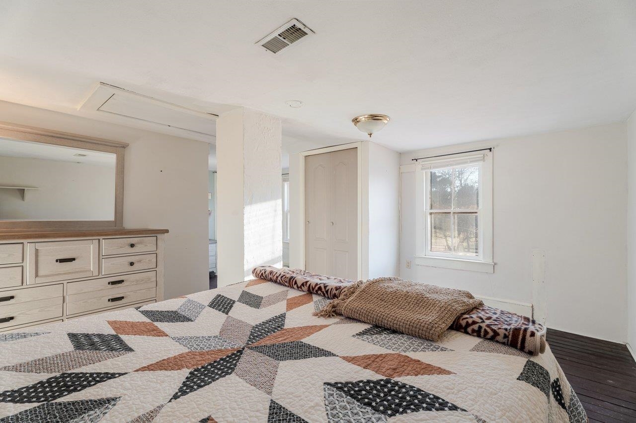 723 Sedwick Road Luray, VA 22835 - Photo 23 of 51 a bedroom with a bed a dresser and a window