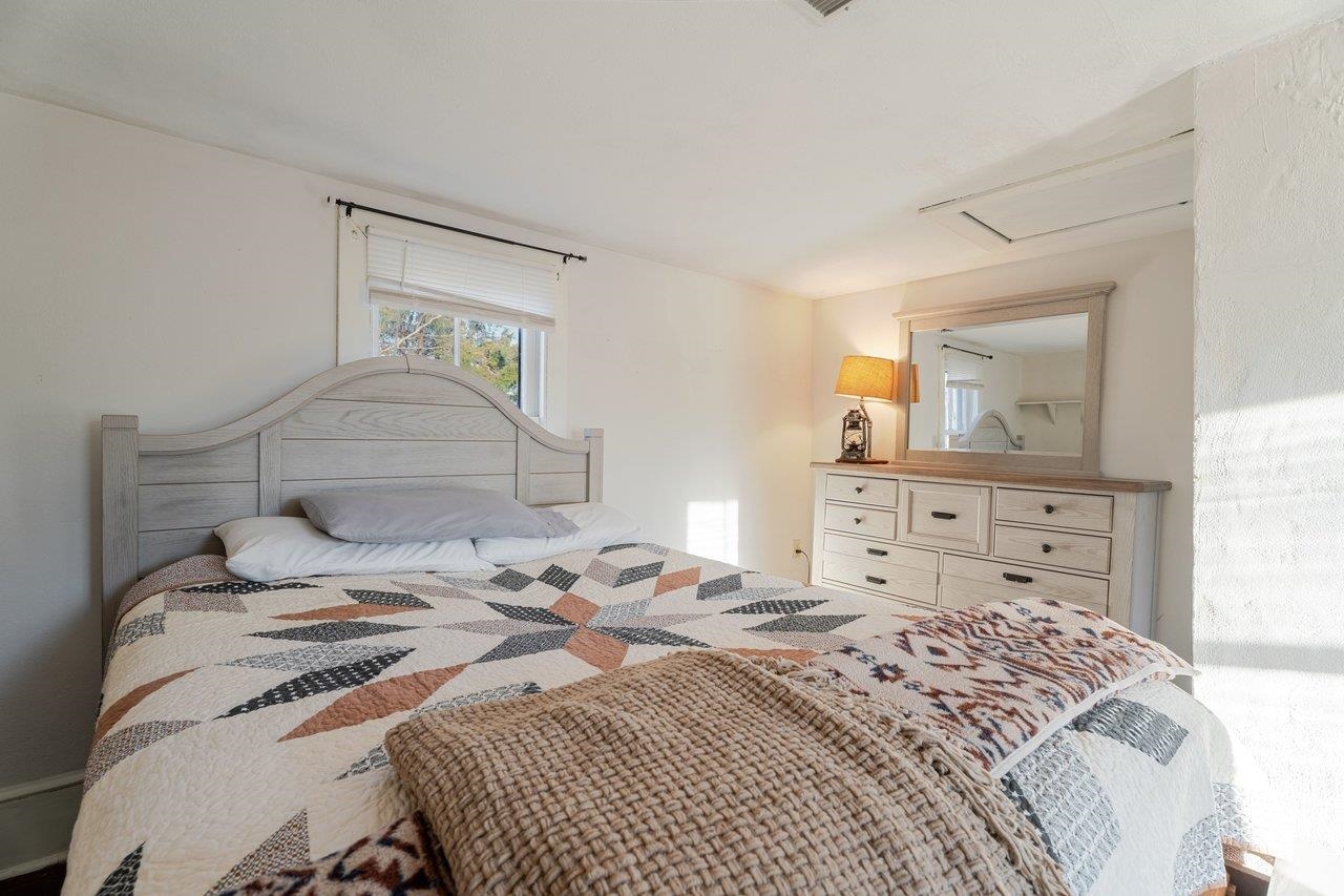 723 Sedwick Road Luray, VA 22835 - Photo 25 of 51 a bedroom with a bed and a mirror