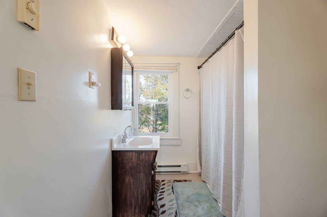 723 Sedwick Road Luray, VA 22835 - Photo 27 of 51 a bathroom with a sink and a mirror