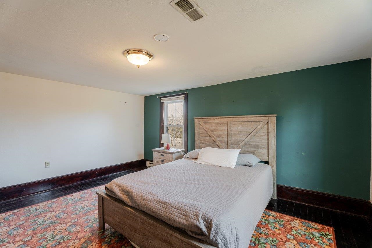 723 Sedwick Road Luray, VA 22835 - Photo 29 of 51 a bedroom with a bed and a dresser