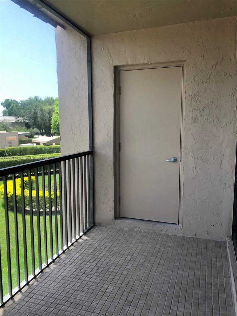 330 Racquet Club Road, Unit 201 Weston, FL 33326 - Photo 20 of 43 a view of a balcony