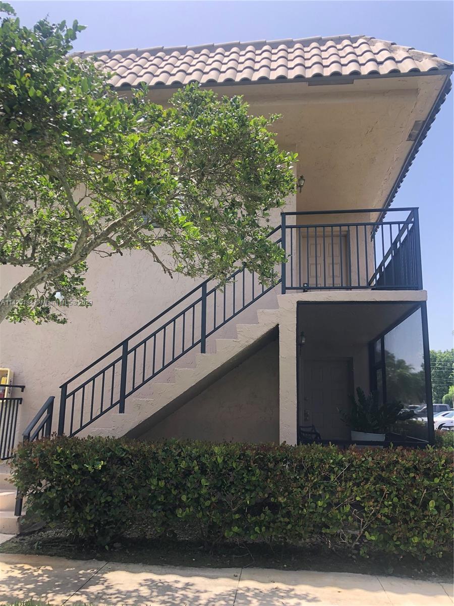 330 Racquet Club Road, Unit 201 Weston, FL 33326 - Photo 2 of 43 a view of balcony with an outdoor space