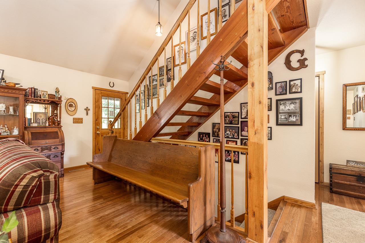 6287 South Perryville Road Cherry Valley, IL 61016 - Photo 13 of 38 a view of entryway and hall with wooden floor