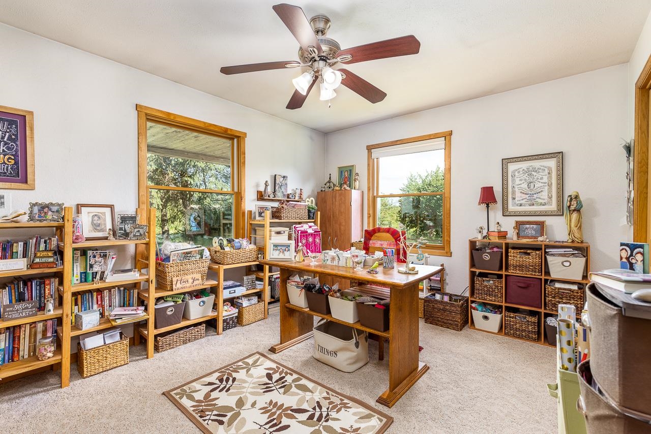 6287 South Perryville Road Cherry Valley, IL 61016 - Photo 15 of 38 a room with workspace and a window