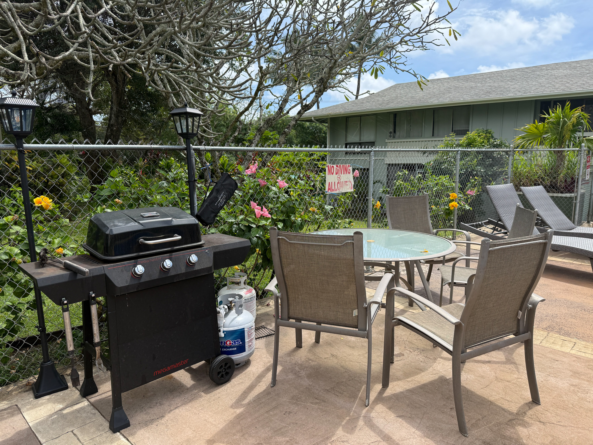 3057 Poipu Road, Unit D13 Koloa, HI 96756 - Photo 18 of 18 a view of outdoor space dining table and chairs