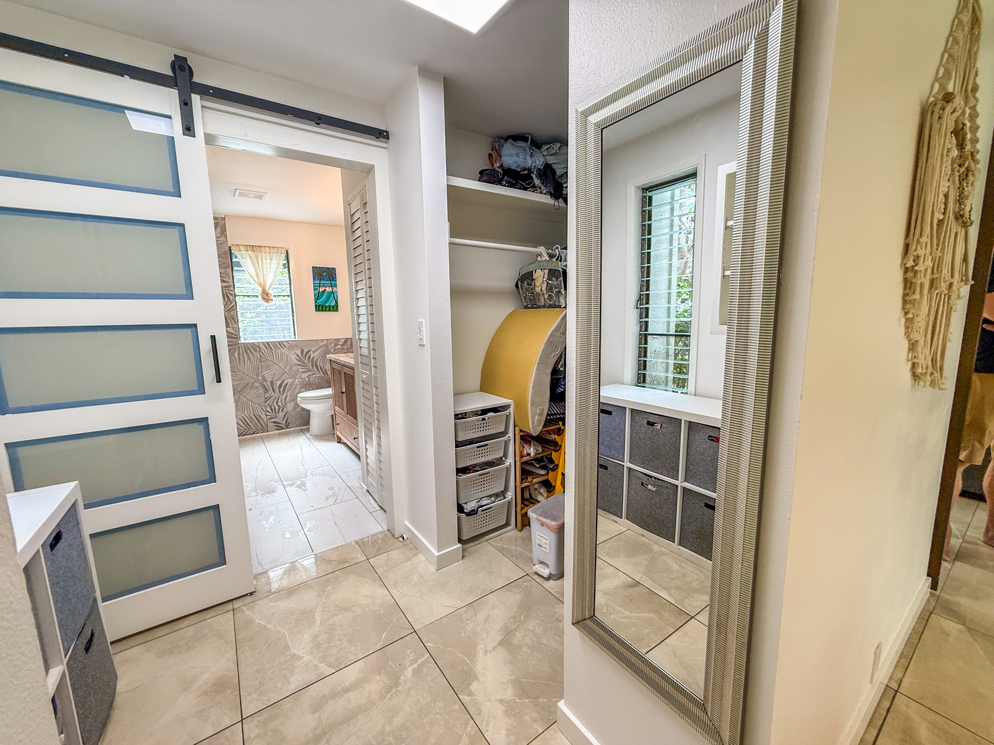 3057 Poipu Road, Unit D13 Koloa, HI 96756 - Photo 9 of 18 a view of walk in closet with empty racks