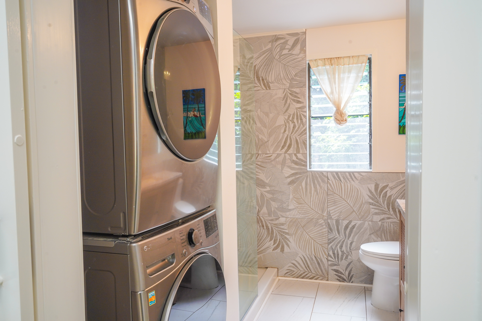 3057 Poipu Road, Unit D13 Koloa, HI 96756 - Photo 10 of 18 a bathroom with a toilet and a mirror