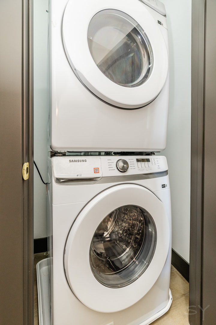 5643 South Prairie Avenue, Unit 1 Chicago, IL 60637 - Photo 15 of 15 a utility room with dryer and washer