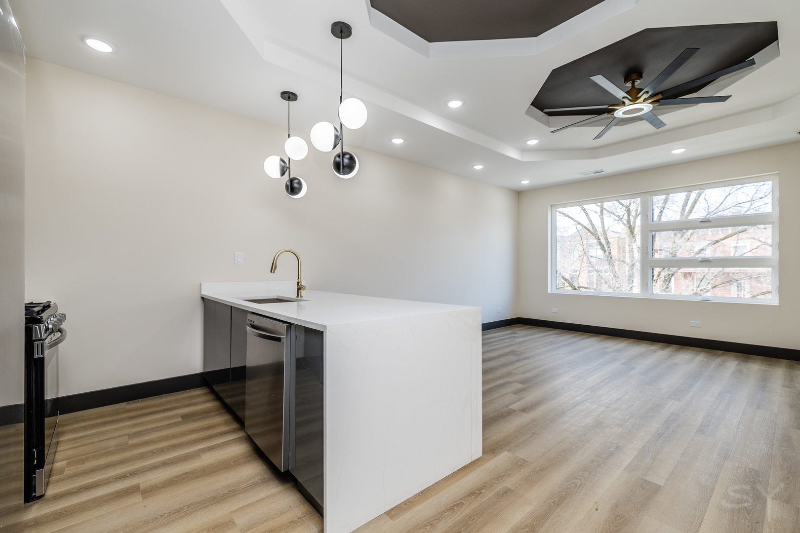 5643 South Prairie Avenue, Unit 1 Chicago, IL 60637 - Photo 6 of 15 a view of an empty room with wooden floor and a window