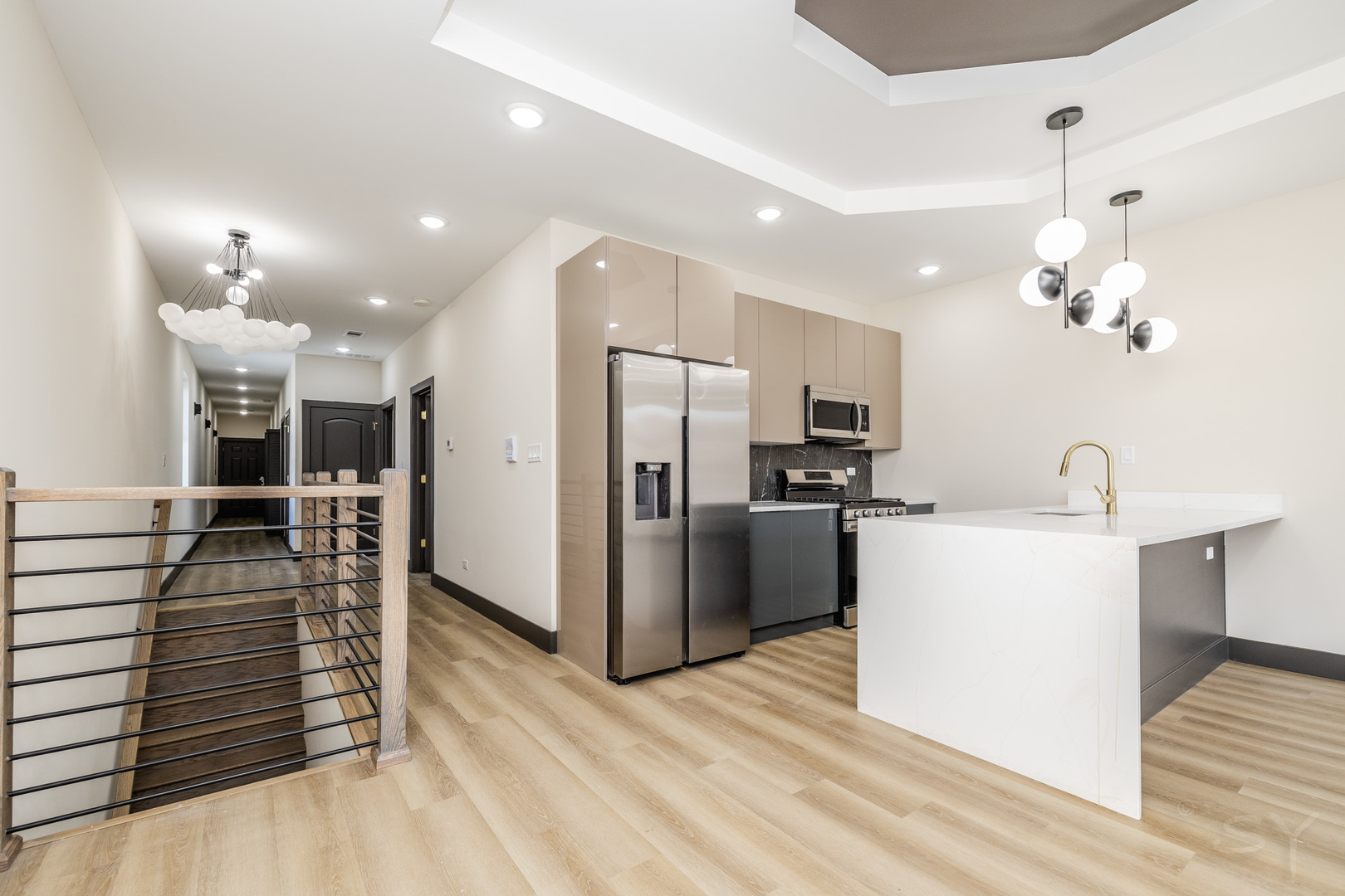5643 South Prairie Avenue, Unit 1 Chicago, IL 60637 - Photo 8 of 15 a view of kitchen with sink microwave and refrigerator