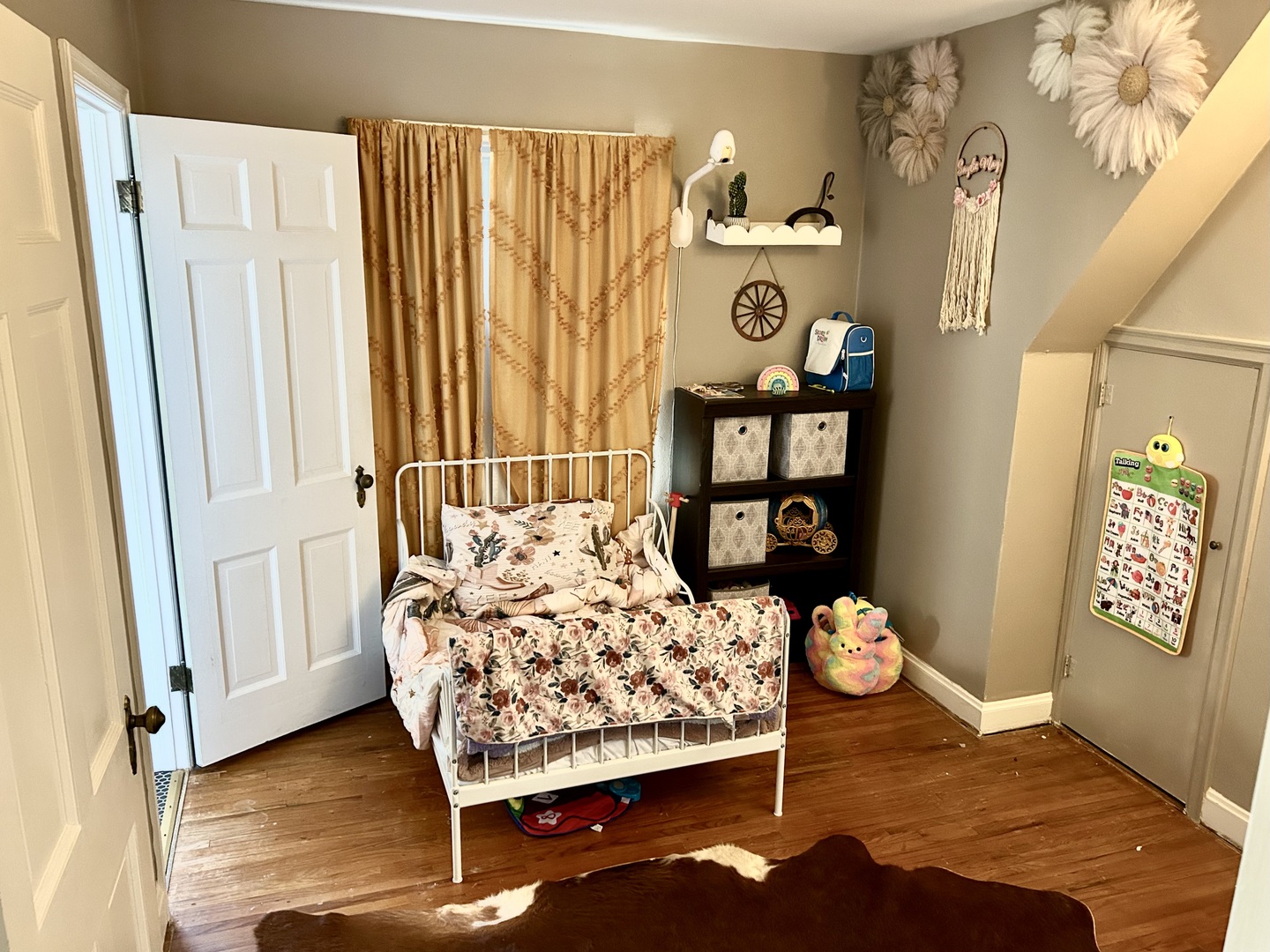 428 East Thompson Street Princeton, IL 61356 - Photo 13 of 22 a bedroom with bed and wooden floor