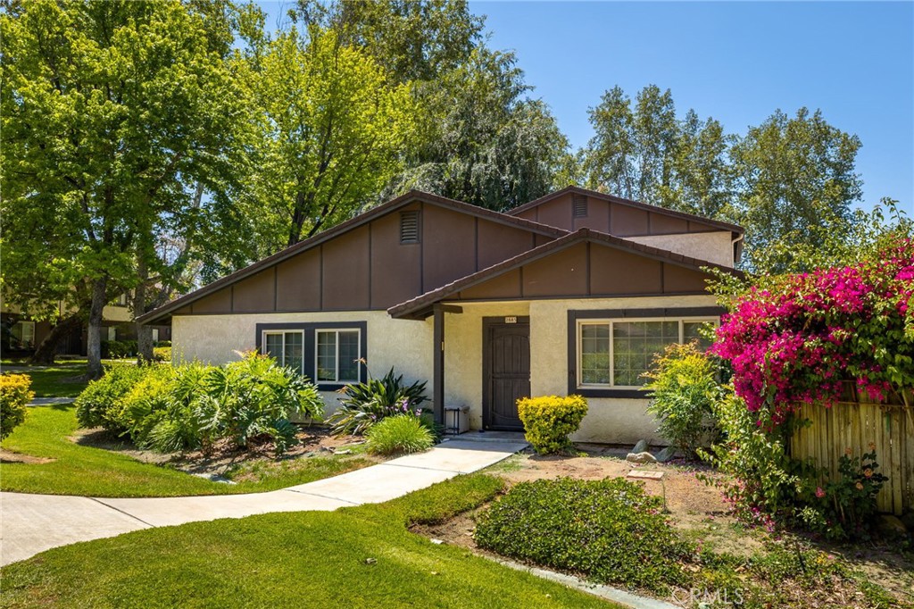2885 Irving Street Riverside, CA 92504 - Photo 1 of 1 a house that has a tree in it