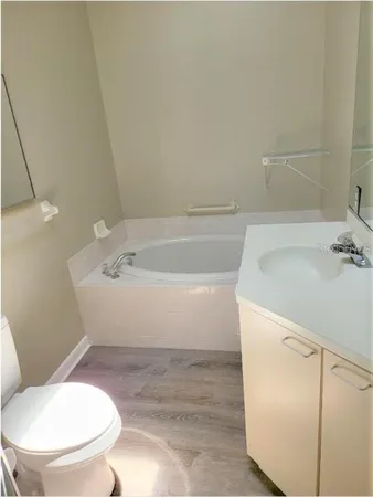 a bathroom with a toilet and a sink