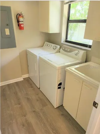 a utility room with dryer and washer