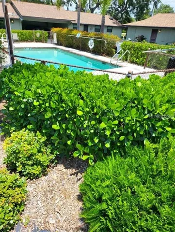 a view of a back yard with green space