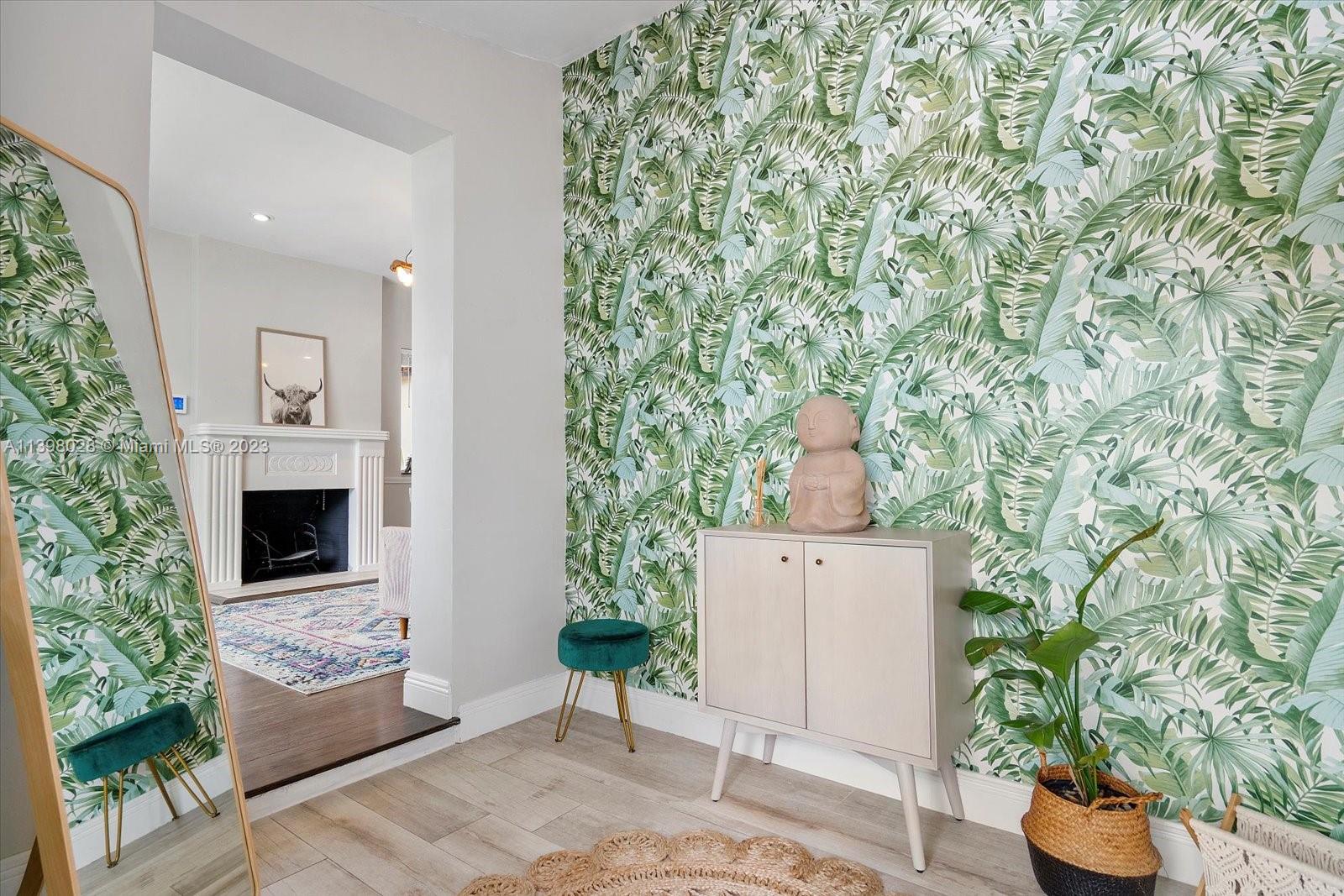 443 Northeast 71st Street Miami, FL 33138 - Photo 13 of 22 a living room with furniture and a potted plant