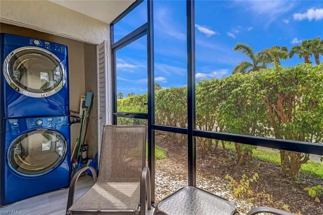 a view of a room with washer and dryer