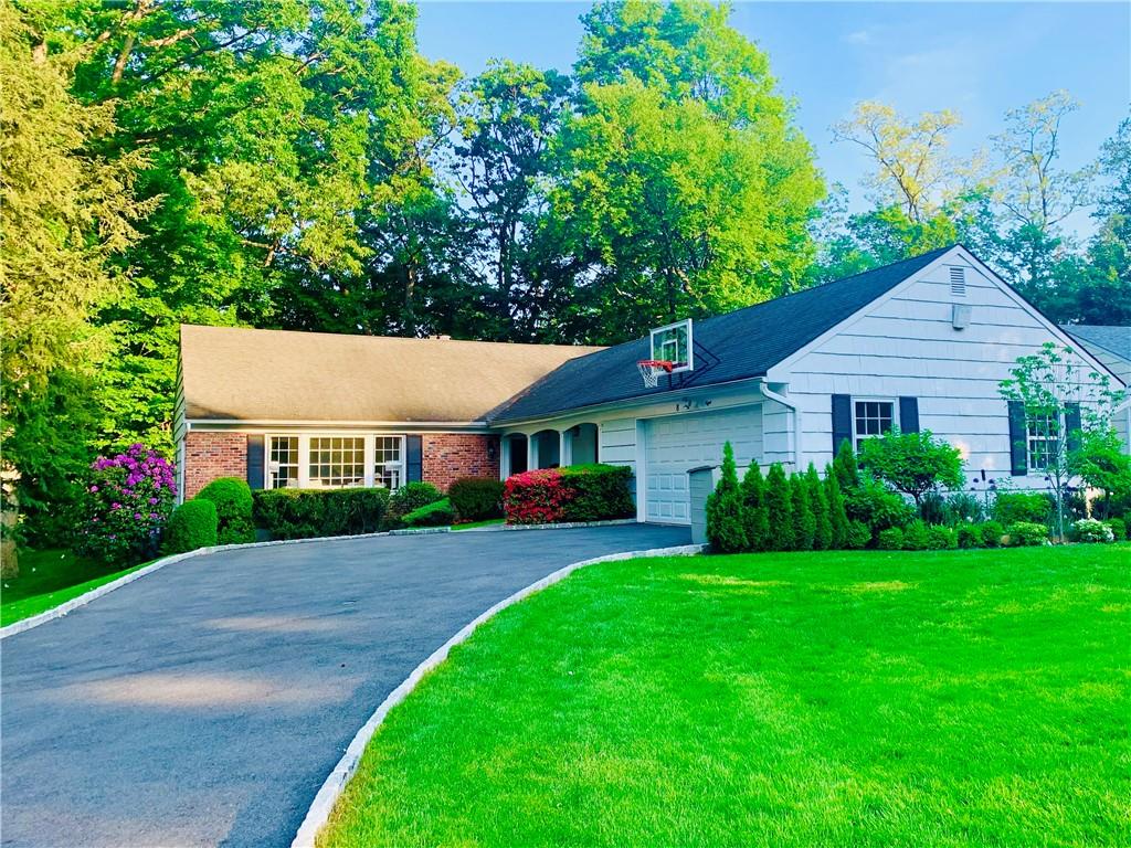 8 Boulder Brook Road Scarsdale, NY 10583 - Photo 1 of 1 a view of a yard in front of a house