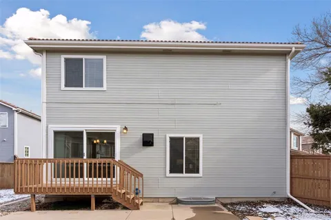 a view of a deck with a yard