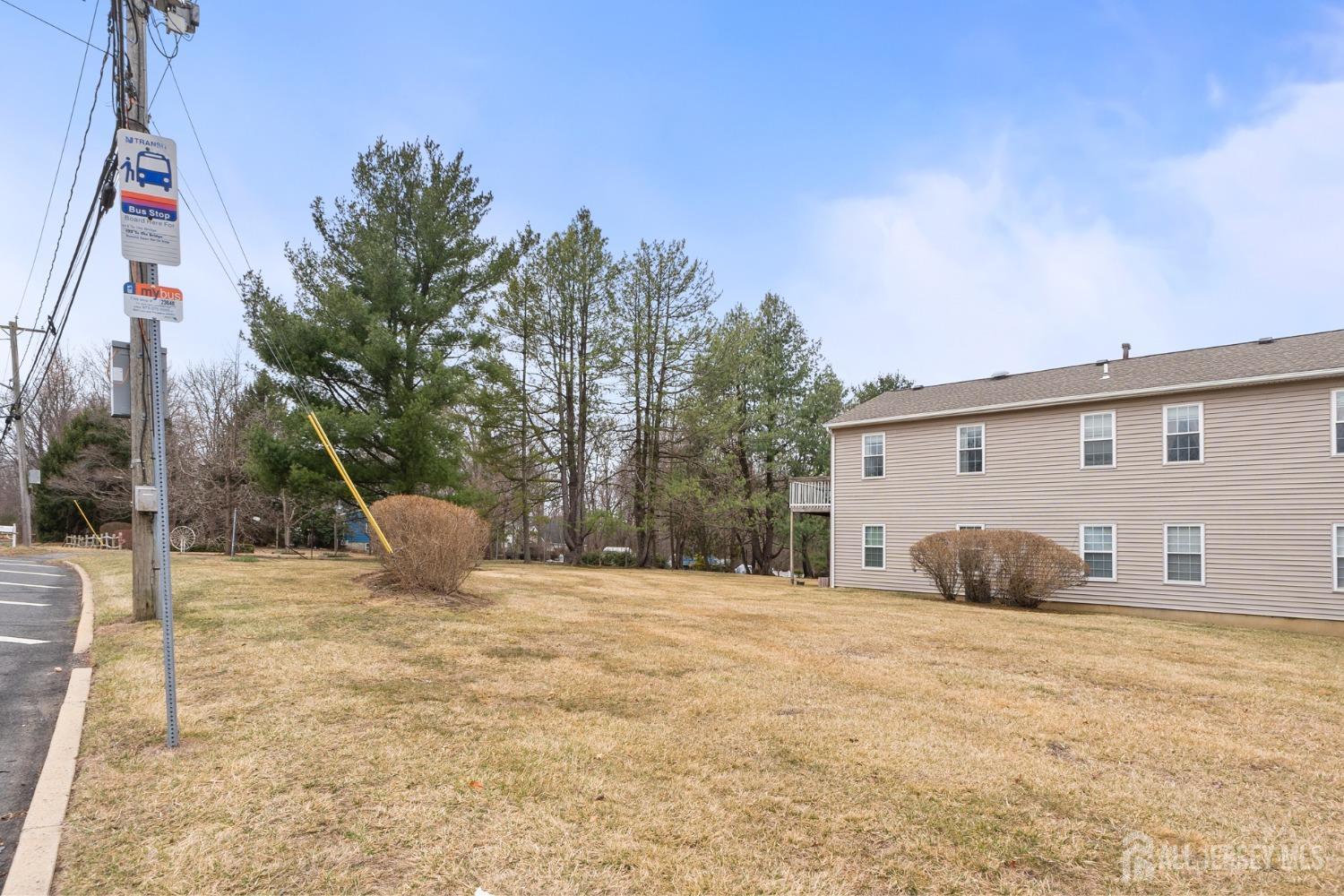 9 Lindsey Circle Old Bridge, NJ 08857 - Photo 16 of 23 a view of a house with backyard and trees